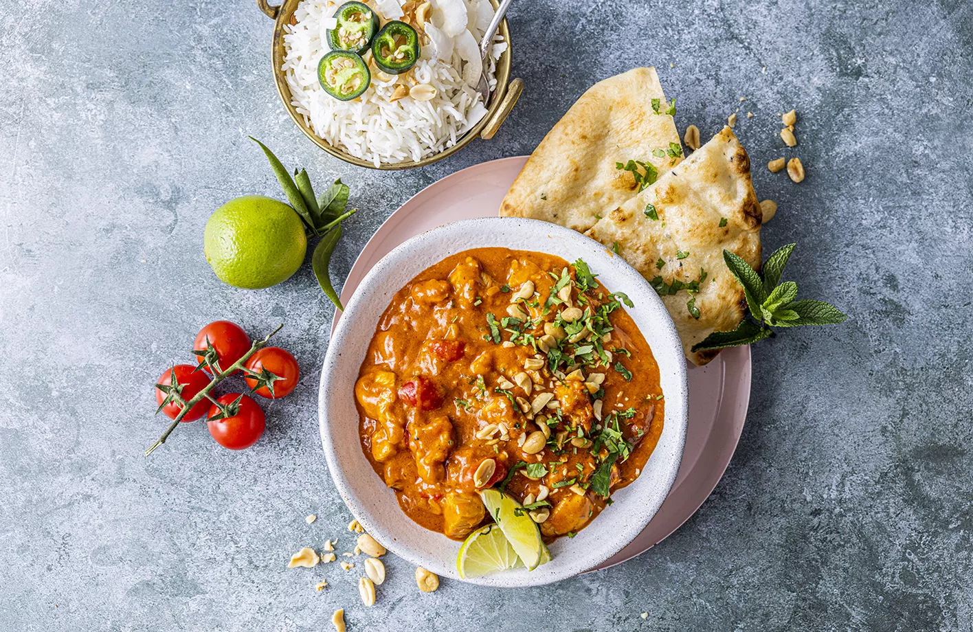 butter chicken med naanbrød og ris